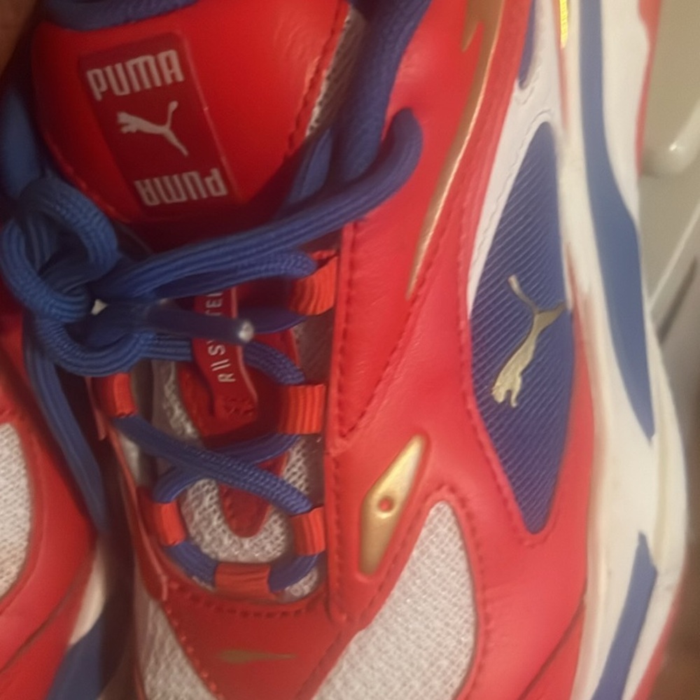Puma Kids Sneakers in Red, Blue, and Gold